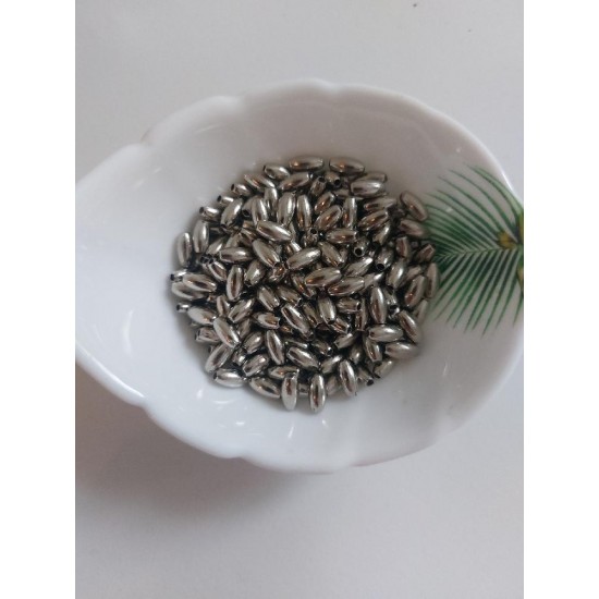 Бусины под жемчуг "рис" 4*8 мм серебро, цена за 10 гр