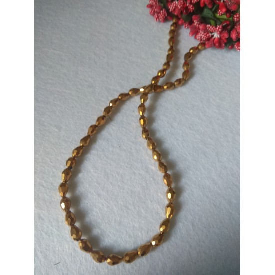 Бусины стеклянные Капля 8*6 мм цв. золото, цена за 24 шт